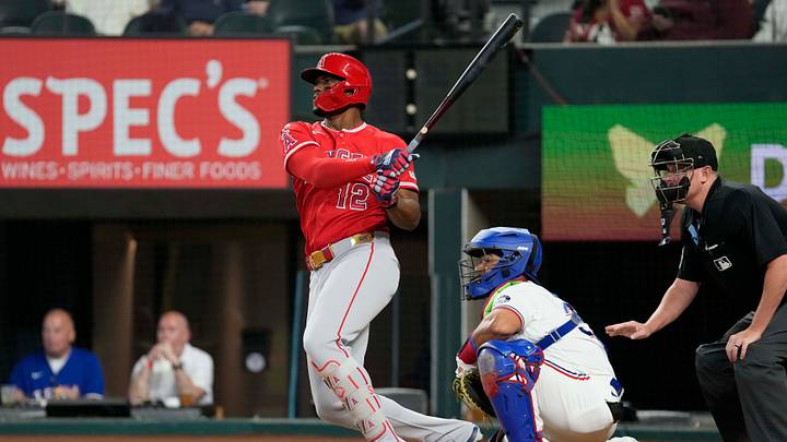 Jul 7, 2026; Arlington, Texas, USA; Los Angeles Angels designated hitter Jorge Soler (12) follows through on his RBI double against the Texas Rangers during the first inning at Globe Life Field. Mandatory Credit: Jim Cowsert-Imagn Images