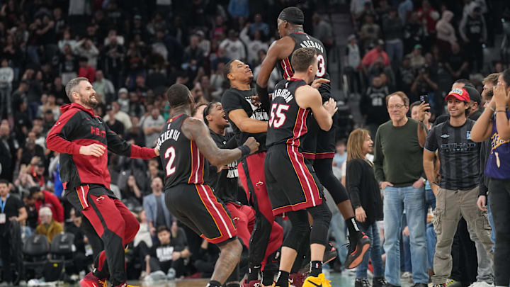 Feb 1, 2025; San Antonio, Texas, USA; Miami Heat players celebrate after center Bam Adebayo (13) scored the winning basket at the end of the game to defeat the San Antonio Spurs at Frost Bank Center. Mandatory Credit: Scott Wachter-Imagn Images