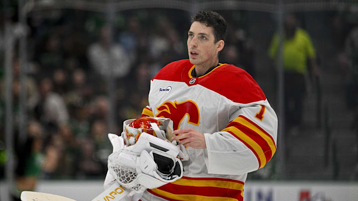 Apr 7, 2026; Dallas, Texas, USA; Calgary Flames goaltender Devin Cooley (1) skates back on the ice during the second period against the Dallas Stars at the American Airlines Center. Mandatory Credit: Jerome Miron-Imagn Images Apr 7, 2026; Dallas, Texas, USA; Calgary Flames goaltender Devin Cooley (1) skates back on the ice during the second period against the Dallas Stars at the American Airlines Center. Mandatory Credit: Jerome Miron-Imagn Images