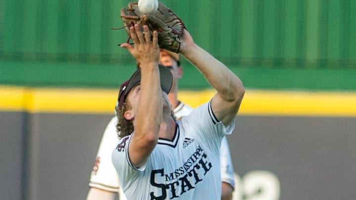 Mississippi State's David Mershon (3) grabs an Ole Miss fly ball at Trustmark Park in Pearl, Miss, Wednesday, May 1, 2024.
