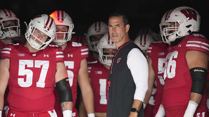 Oct 18, 2025; Madison, Wisconsin, USA; Wisconsin Badgers head coach Luke Fickell during warmups prior to the game against the Ohio State Buckeyes at Camp Randall Stadium. Mandatory Credit: Jeff Hanisch-Imagn Images Oct 18, 2025; Madison, Wisconsin, USA; Wisconsin Badgers head coach Luke Fickell during warmups prior to the game against the Ohio State Buckeyes at Camp Randall Stadium. Mandatory Credit: Jeff Hanisch-Imagn Images