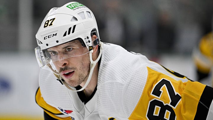 Mar 22, 2024; Dallas, Texas, USA; Pittsburgh Penguins center Sidney Crosby (87) waits for the face-off against the Dallas Stars during the third period at the American Airlines Center.