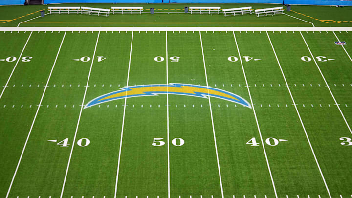 Nov 17, 2024; Inglewood, California, USA; The Los Angeles Chargers bolt logo at midfield at SoFi Stadium. Mandatory Credit: Kirby Lee-Imagn Images