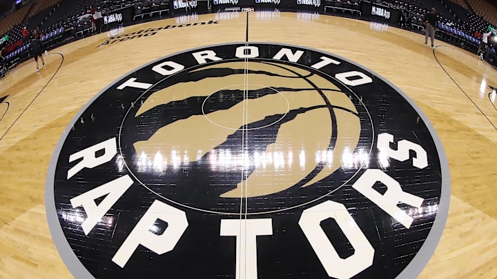 Mar 1, 2019; Toronto, Ontario, CAN; A general view of the Toronto Raptors logo at center court before the start of a game between the Raptors and the Portland Trail Blazers at Scotiabank Arena. Mandatory Credit: Tom Szczerbowski-Imagn Images