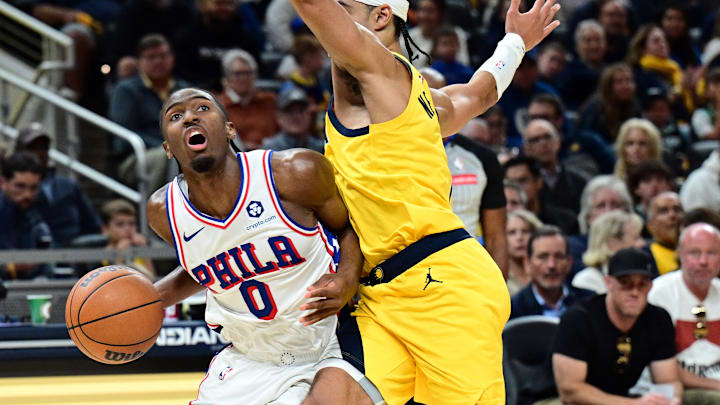 Oct 27, 2024; Indianapolis, Indiana, USA; Philadelphia 76ers guard Tyrese Maxey (0) looks up at the basket past Indiana Pacers guard Andrew Nembhard (2) during the second half at Gainbridge Fieldhouse. Mandatory Credit: Marc Lebryk-Imagn Images Oct 27, 2024; Indianapolis, Indiana, USA; Philadelphia 76ers guard Tyrese Maxey (0) looks up at the basket past Indiana Pacers guard Andrew Nembhard (2) during the second half at Gainbridge Fieldhouse. Mandatory Credit: Marc Lebryk-Imagn Images