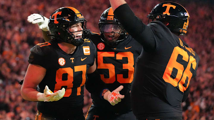 Nov 2, 2024; Knoxville, Tennessee, USA; Tennessee tight end Miles Kitselman (87) celebrates with offensive lineman Lance Heard (53) and offensive lineman Dayne Davis (66) after scoring a touchdown against the Kentucky Wildcats during the first half at Neyland Stadium. Mandatory Credit: Angelina Alcantar/USA TODAY Network via Imagn Images