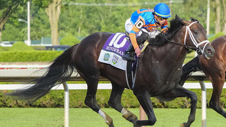 Jun 8, 2024; Saratoga Springs, NY, USA; Dornoch with Luis Saez up (6) in the lead down the final front stretch followed by Mindframe with Irad Ortiz Jr. up (10) during the Belmont Stake at Saratoga Race Course.
