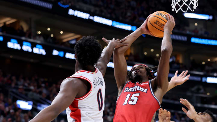 Mar 23, 2024; Salt Lake City, UT, USA; Dayton Flyers forward DaRon Holmes II (15) shoots against Arizona Wildcats guard Jaden Bradley (0) and guard KJ Lewis (5) during the second half in the second round of the 2024 NCAA Tournament at Vivint Smart Home Arena-Delta Center. Mandatory Credit: Rob Gray-USA TODAY Sports Mar 23, 2024; Salt Lake City, UT, USA; Dayton Flyers forward DaRon Holmes II (15) shoots against Arizona Wildcats guard Jaden Bradley (0) and guard KJ Lewis (5) during the second half in the second round of the 2024 NCAA Tournament at Vivint Smart Home Arena-Delta Center. Mandatory Credit: Rob Gray-USA TODAY Sports