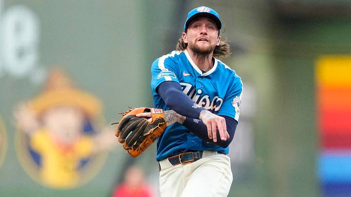 Jul 17, 2026; Milwaukee, Wisconsin, USA;  Milwaukee Brewers second baseman Brice Turang (2) throws to first base during the fourth inning against the Miami Marlins at American Family Field. Mandatory Credit: Jeff Hanisch-Imagn Images