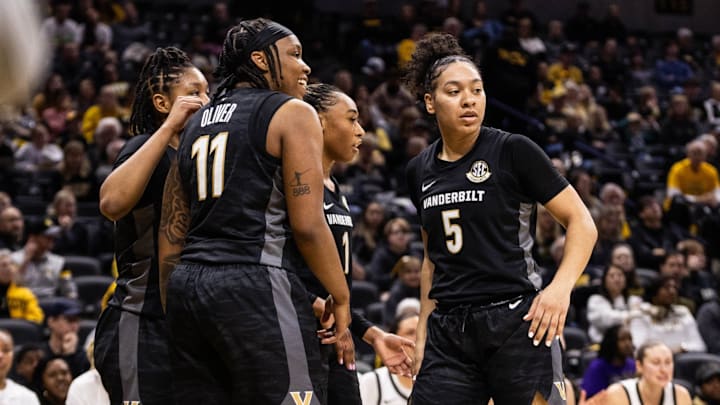 Vanderbilt women's basketball players gather together during a break in Sunday's game against Missouri that the Commodores won 100-59.