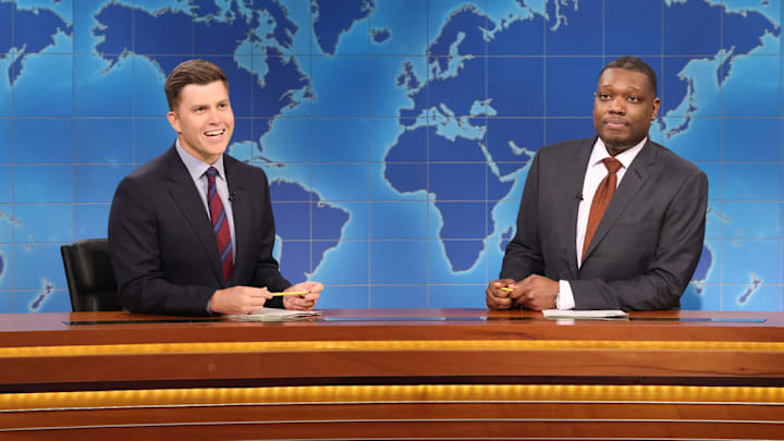 SATURDAY NIGHT LIVE -- Episode 1864 -- Pictured: (l-r) Anchor Colin Jost and anchor Michael Che during Weekend Update on Saturday, May 18, 2024 -- 