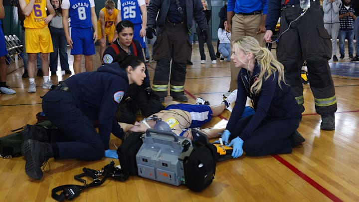 CHICAGO FIRE -- "On The Hook" Episode 12005 -- Pictured: (l-r) Hanako Greensmith as Violet Mikami, Miranda Rae Mayo as Stella Kidd, Christian Stolte as Randy "Mouch" McHolland, Kara Killmer as Sylvie Brett -- (Photo by: Adrian S Burrows Sr/NBC)