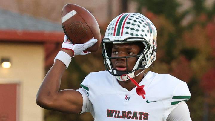 Lawrence North Monshun Sales (1) participates in warm up drills as Lawrence North took on Lawrence Central in the S6 IHSAA high school football sectional semifinal, Nov 1, 2024; Indianapolis, IN, USA; at Lawrence Central High School.