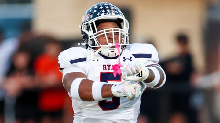 Denton Billy Ryan's Uzziah Warmate celebrates a tackle against Aledo. Denton Billy Ryan's Uzziah Warmate celebrates a tackle against Aledo.