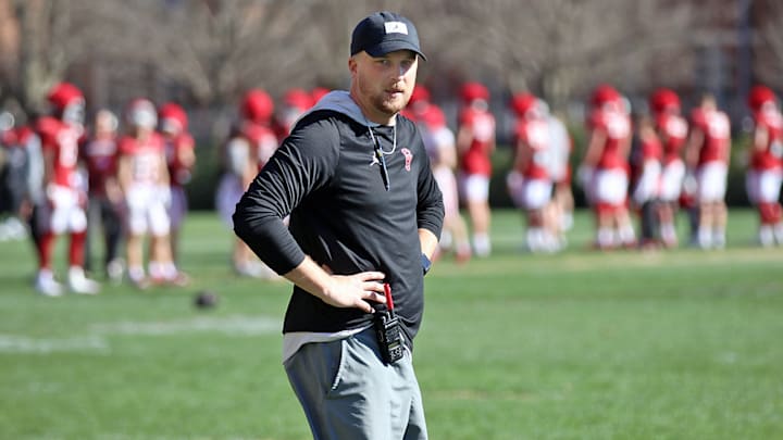 Oklahoma quarterbacks coach Ben Arbuckle looks on during one of the Sooners' practices.