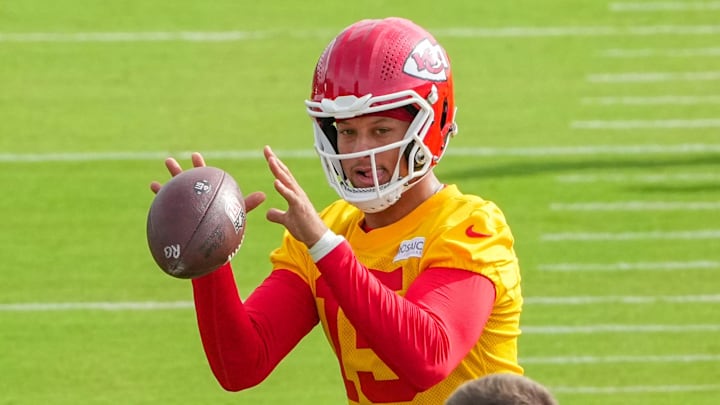Jul 22, 2025; St. Joseph, MO, USA; Kansas City Chiefs quarterback Patrick Mahomes (15) receives a snap during training camp at Missouri Western State University. Mandatory Credit: Denny Medley-Imagn Images