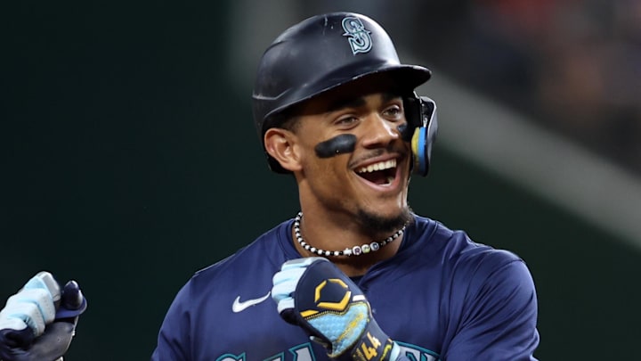 Seattle Mariners center fielder Julio Rodriguez (44) reacts after hitting a three-run home run against the Texas Rangers in the fifth inning at Globe Life Field in 2024.