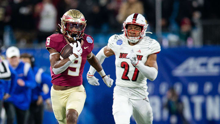 Florida State Seminoles running back Lawrance Toafili (9) sprints down the field towards the end