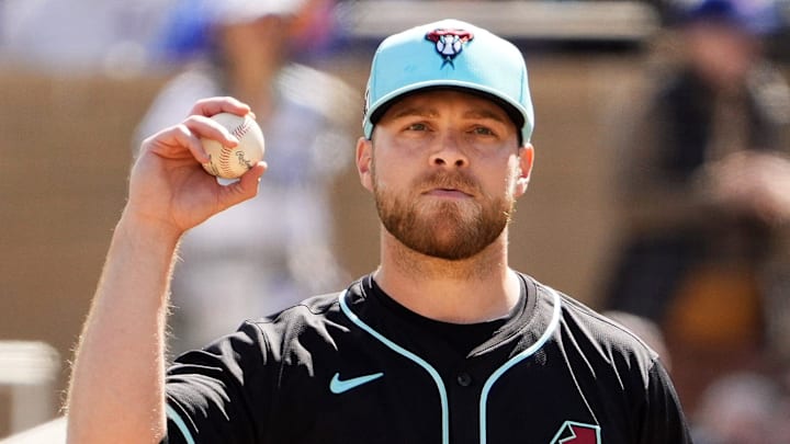 Arizona Diamondbacks pitcher Corbin Burnes prepares to throw to the Chicago Cubs in the first inning during a spring training game at Salt River Fields on March 3, 2025. Arizona Diamondbacks pitcher Corbin Burnes prepares to throw to the Chicago Cubs in the first inning during a spring training game at Salt River Fields on March 3, 2025.