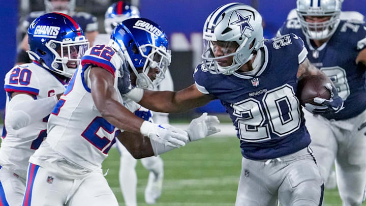 Sep 26, 2022; East Rutherford, NJ, USA;  Dallas Cowboys running back Tony Pollard (20) runs with the