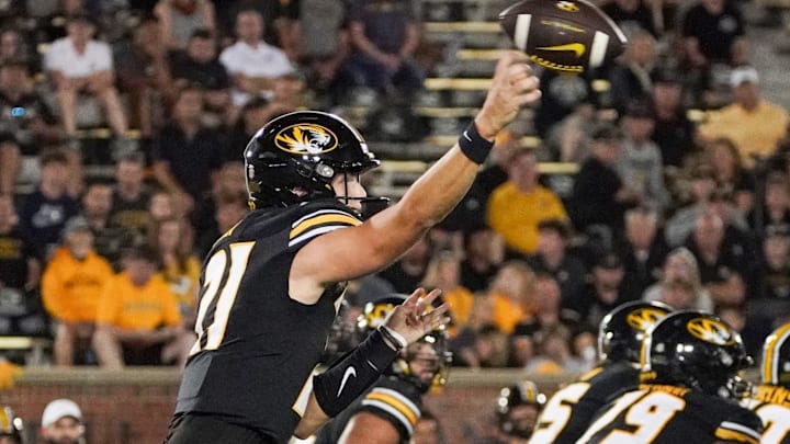 Aug 31, 2023; Columbia, Missouri, USA; Missouri Tigers quarterback Sam Horn (21) throws a pass against the South Dakota Coyotes during the second half at Faurot Field at Memorial Stadium. Mandatory Credit: Denny Medley-Imagn Images