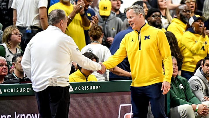 Michigan State's head coach Tom Izzo, left, shakes hands with Michigan's head coach Dusty May after the game on Friday, Jan. 30, 2026, at the Breslin Center in East Lansing.