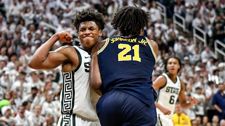 Michigan State's Jeremy Fears Jr., left, celebrates next to Michigan's Morez Johnson Jr. after a score during the second half on Friday, Jan. 30, 2026, at the Breslin Center in East Lansing.