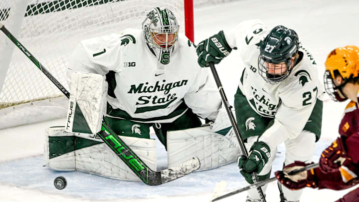 Michigan State's Trey Augustine, left, guards the goal against Minnesota during the first period on Saturday, Jan. 25, 2025, at Munn Arena in East Lansing.
