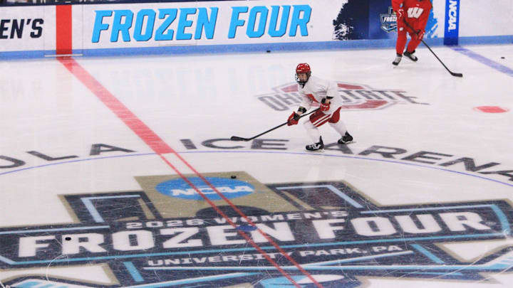Wisconsin players warm up for practice at the Frozen Four at Pegula Ice Arena in University Park, Pa. on March 19, 2026.