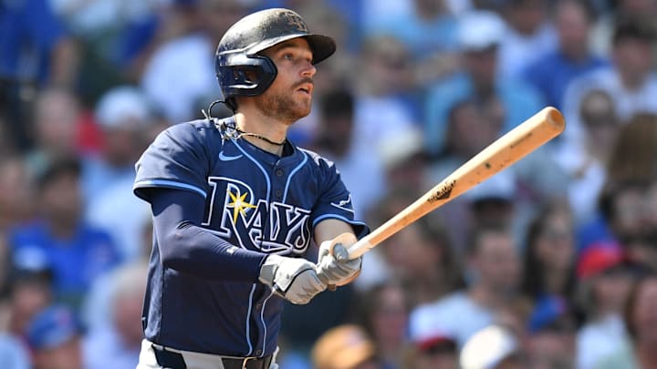 Sep 13, 2025; Chicago, Illinois, USA; Tampa Bay Rays second baseman Brandon Lowe (8) hits an RBI single against the Chicago Cubs during the sixth inning at Wrigley Field. Mandatory Credit: Patrick Gorski-Imagn Images