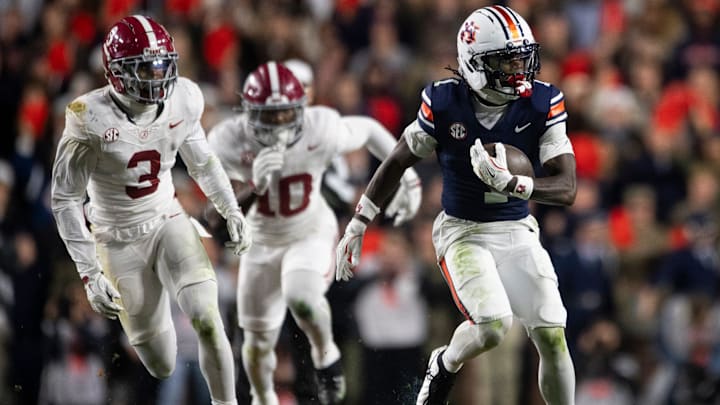 Auburn Tigers wide receiver Eric Singleton Jr. (1) turns up field after a catch as Auburn Tigers take on Alabama Crimson Tide in the Iron Bowl at Jordan-Hare Stadium in Auburn, Ala. on Saturday, Nov. 29, 2025. Alabama Crimson Tide defeated Auburn Tigers 27-20.