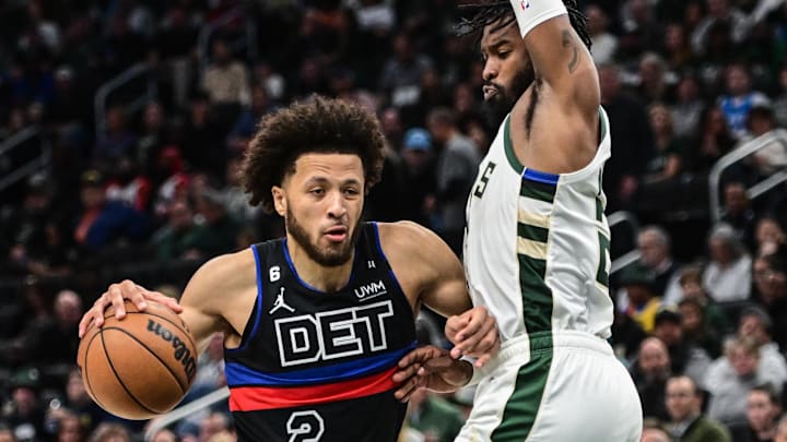 Nov 2, 2022; Milwaukee, Wisconsin, USA; Detroit Pistons guard Cade Cunningham (2) drives to the basket against Milwaukee Bucks guard Wesley Matthews (23) in the third quarter at Fiserv Forum. Mandatory Credit: Benny Sieu-Imagn Images