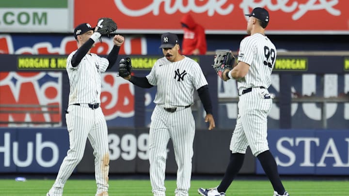 Oct 2, 2025; Bronx, New York, USA; New York Yankee outfielders Cody Bellinger (35), Trent Grisham (12) and Aaron Judge (99) react following game three of the Wildcard round for the 2025 MLB playoffs against the Boston Red Sox at Yankee Stadium. Mandatory Credit: Vincent Carchietta-Imagn Images Oct 2, 2025; Bronx, New York, USA; New York Yankee outfielders Cody Bellinger (35), Trent Grisham (12) and Aaron Judge (99) react following game three of the Wildcard round for the 2025 MLB playoffs against the Boston Red Sox at Yankee Stadium. Mandatory Credit: Vincent Carchietta-Imagn Images