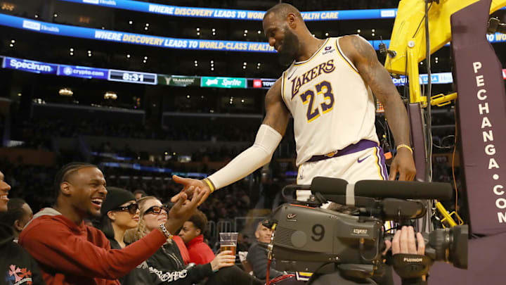 Nov 19, 2023; Los Angeles, California, USA; Los Angeles Lakers forward LeBron James (23) shakes hands with his son Bronny James during the second half against the Houston Rockets at Crypto.com Arena. Mandatory Credit: Kiyoshi Mio-Imagn Images Nov 19, 2023; Los Angeles, California, USA; Los Angeles Lakers forward LeBron James (23) shakes hands with his son Bronny James during the second half against the Houston Rockets at Crypto.com Arena. Mandatory Credit: Kiyoshi Mio-Imagn Images