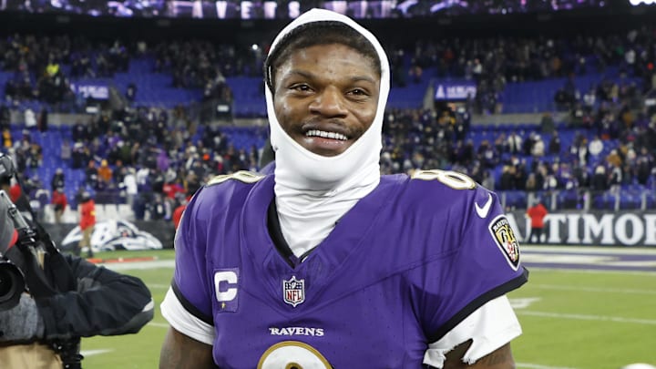 Baltimore Ravens quarterback Lamar Jackson celebrates after defeating the Pittsburgh Steelers.