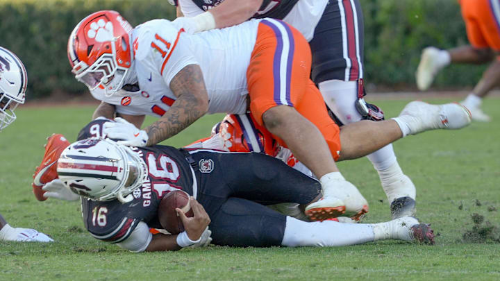 Clemson DT Peter Woods sacks South Carolina quarterback LaNorris Sellers. Clemson DT Peter Woods sacks South Carolina quarterback LaNorris Sellers.