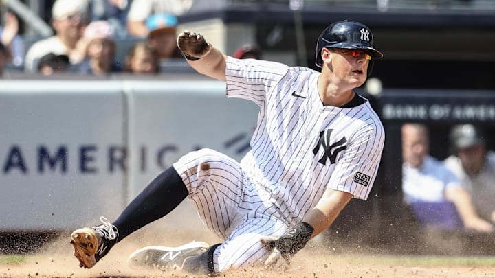 Aug 25, 2024; Bronx, New York, USA; New York Yankees first baseman DJ LeMahieu (26) slides safely at home plate in the second inning against the Colorado Rockies at Yankee Stadium. Mandatory Credit: Wendell Cruz-Imagn Images Aug 25, 2024; Bronx, New York, USA; New York Yankees first baseman DJ LeMahieu (26) slides safely at home plate in the second inning against the Colorado Rockies at Yankee Stadium. Mandatory Credit: Wendell Cruz-Imagn Images