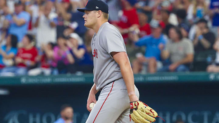 Mar 30, 2025; Arlington, Texas, USA;  Boston Red Sox starting pitcher Richard Fitts (80) reacts after giving up a home run to Texas Rangers right fielder Adolis Garcia (not pictured) during the sixth inning at Globe Life Field. Mandatory Credit: Kevin Jairaj-Imagn Images