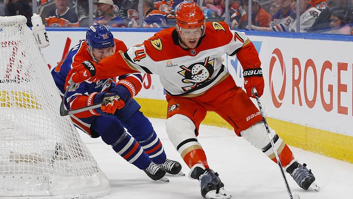 Apr 28, 2026; Edmonton, Alberta, CAN; Anaheim Ducks defensemen John Carlson (74) protects the puck from Edmonton Oilers forward Zach Hyman (18) during the third period in game five of the first round of the 2026 Stanley Cup Playoffs at Rogers Place. Mandatory Credit: Perry Nelson-Imagn Images Apr 28, 2026; Edmonton, Alberta, CAN; Anaheim Ducks defensemen John Carlson (74) protects the puck from Edmonton Oilers forward Zach Hyman (18) during the third period in game five of the first round of the 2026 Stanley Cup Playoffs at Rogers Place. Mandatory Credit: Perry Nelson-Imagn Images