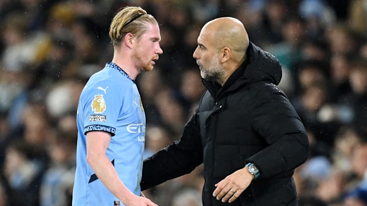 Pep Guardiola (right) has been discussing Kevin De Bruyne's Man City future