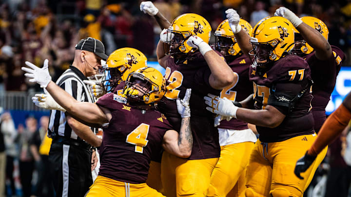 Arizona State celebrates after Sun Devils running back Cam Skattebo (4) scores a touchdown in the fourth quarter of the Peach Bowl.