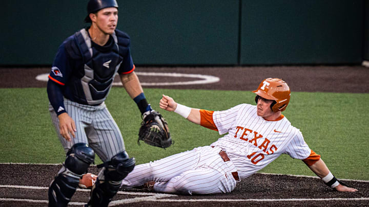 Texas catcher Kimble Schuessler (10) slides safely home to score a run in the second inning of the Longhorns' game against the UTSA Roadrunners, March 18, 2025 at UFCU Disch-Falk Field in Austin.