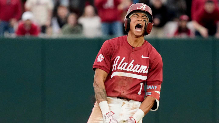 Feb 14, 2025; Tuscaloosa, AL, USA; Justin Lebron celebrates at second after hitting a three-run double during Alabama baseball’s opening day at Sewell-Thomas Stadium against Bradley. The Crimson Tide defeated Bradley 10-6.