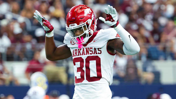Sep 28, 2024; Arlington, Texas, USA;  Arkansas Razorbacks linebacker Larry Worth III (30) reacts during the first half against the Texas A&M Aggies at AT&T Stadium. Mandatory Credit: Kevin Jairaj-Imagn Images