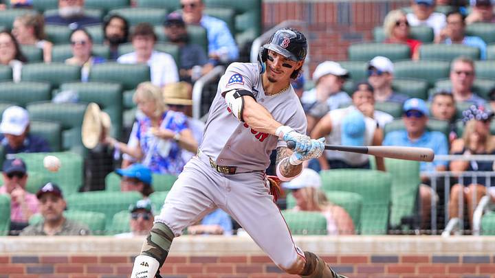 May 17, 2026; Cumberland, Georgia, USA; Boston Red Sox left fielder Jarren Duran (16) hits a double against the Boston Red Sox during the third inning at Truist Park. Mandatory Credit: Jordan Godfree-Imagn Images