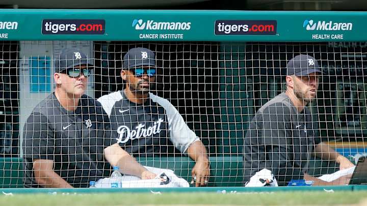 Detroit Tigers coaches A.J. Hinch, George Lombard and Chris Fetter watch on in a game between the Tampa Bay Rays and Detroit Tigers