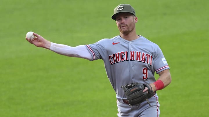May 16, 2026; Cleveland, Ohio, USA; Cincinnati Reds second baseman Matt McLain (9) throws to first base in the fourth inning against the Cleveland Guardians at Progressive Field. Mandatory Credit: David Richard-Imagn Images