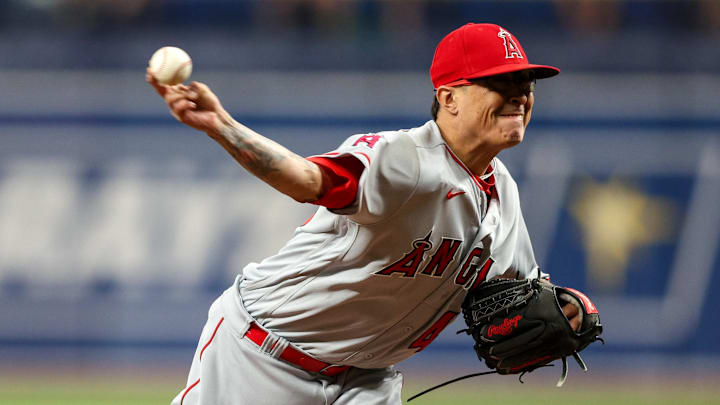 Aug 23, 2022; St. Petersburg, Florida, USA;  Los Angeles Angels relief pitcher Jesse Chavez (40) throws a pitch against the Tampa Bay Rays in the sixth inning at Tropicana Field. Mandatory Credit: Nathan Ray Seebeck-Imagn Images