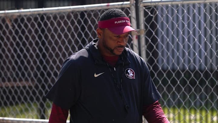 FSU football players walk into the first spring practice of the spring season on Wednesday, March 19, 2025