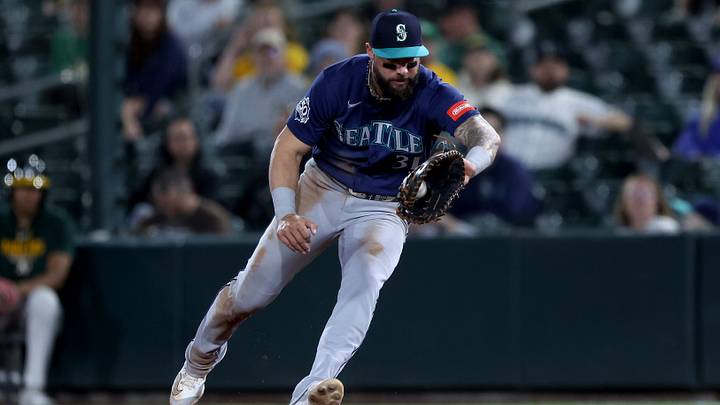 Sep 12, 2026; West Sacramento, California, USA; Seattle Mariners first baseman Weston Wilson (31) fields a ball hit by Athletics right fielder Lawrence Butler (not pictured) during the eighth inning at Sutter Health Park. Mandatory Credit: Dennis Lee-Imagn Images Sep 12, 2026; West Sacramento, California, USA; Seattle Mariners first baseman Weston Wilson (31) fields a ball hit by Athletics right fielder Lawrence Butler (not pictured) during the eighth inning at Sutter Health Park. Mandatory Credit: Dennis Lee-Imagn Images